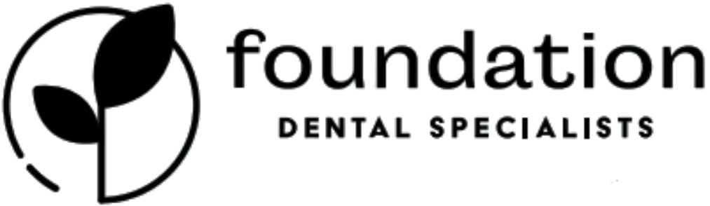 Foundation Dental Specialists logo with leaf icon in black and white
